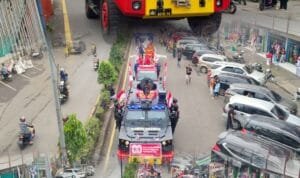 Semarak HUT ke-80 RI  Satbrimob Polda Sumsel Batalyon B Pelopor Tunjukkan Kedekatan Dengan Masyarakat Lewat Pawai Kemerdekaan