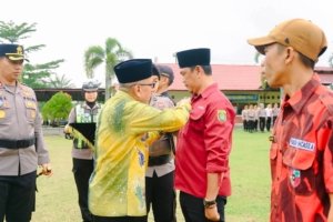Sekda Musi Rawas Hadiri Apel Pencanangan Sabuk Kamtibmas “Jaga Musi Rawas”